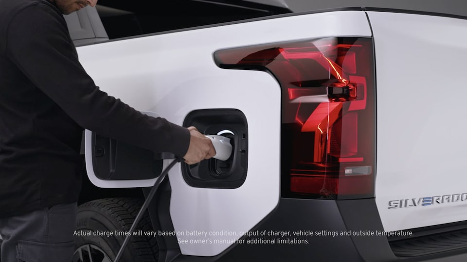 A video showing the proces of connecting a charger cable to the charger port for the Silverado EV.