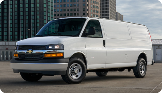 A White Chevrolet Express Van in three-quarters view.