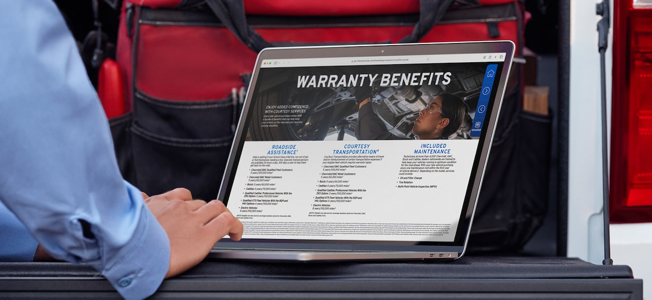 a computer showing a vehicle manual