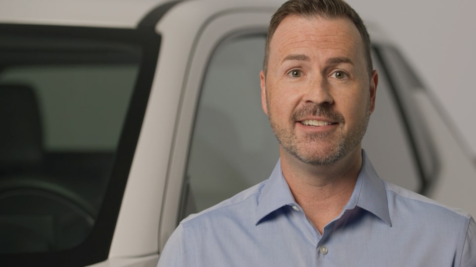 Image of person describing installation process of the OnStar DualCam