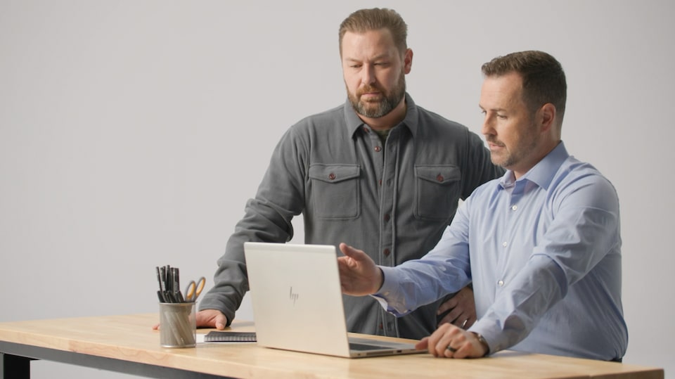 Image of person reviewing OnStar Vehicle Insights account data