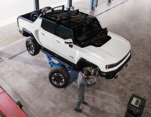 A GMC HUMMER getting service done at a shop