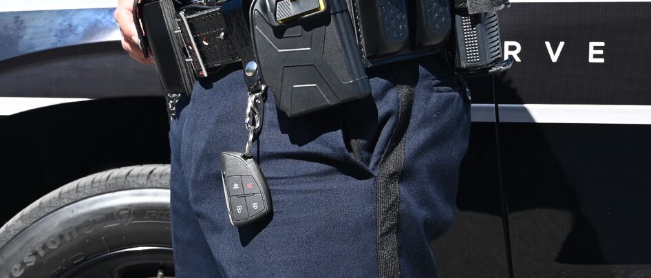 Chevrolet car key on police's duty belt