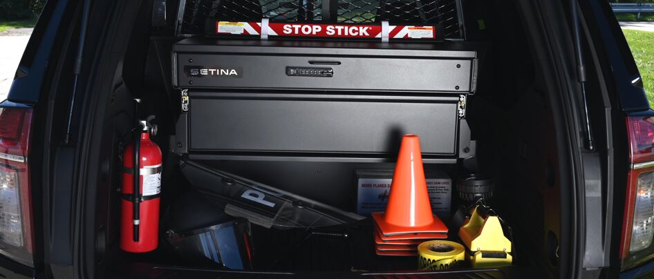Trunk of Chevrolet police vehicle with gear